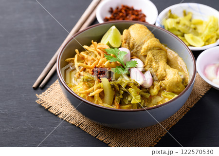 Northern Thai food (Khao Soi), Spicy curry noodles soup with chicken, Local Thai food Northern Thai food (Khao Soi), Spicy curry noodles soup with chicken, Local Thai food 122570530