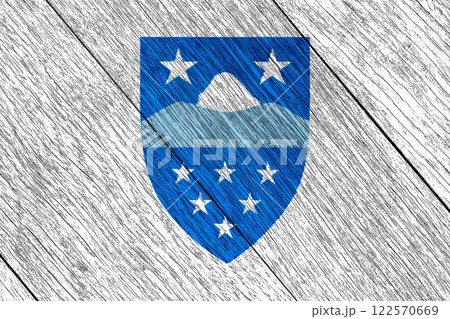 Official flag and coat of arms of Qeqqata. Greenland. Conceptual collage on wood texture Official flag and coat of arms of Qeqqata. Greenland. Conceptual collage on wood texture 122570669