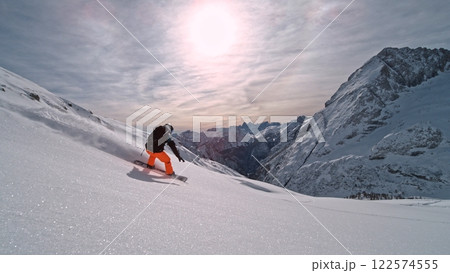 Freeze Motion of Snowboarder Running Down. Powder Snow Exploding. 122574555