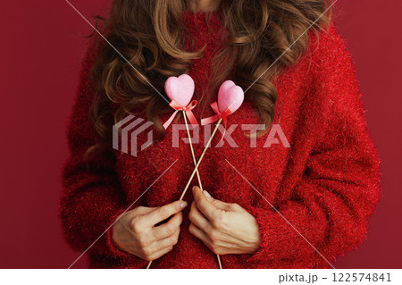 Closeup on woman in red sweater and beret 122574841