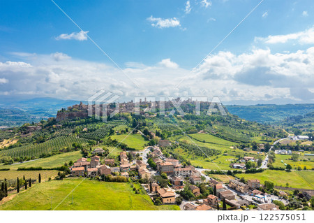 Orvieto, Umbria, Italy: Panoramic view of town nestled in hills. 122575051