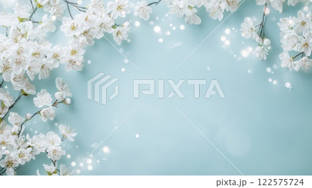 Delicate Blossoming Flowers Against a Soft Blue Background 122575724