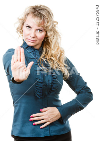 Adult blondie woman making hand gesture 122575943