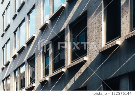 Sunlit Modern Building Facade Sunlit Modern Building Facade 122576144