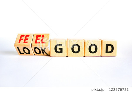 Look and feel good symbol. Concept words Look good Feel good on wooden cubes. Beautiful white table white background. Healthy lifestyle look and feel good concept. Copy space. 122576721