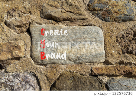CYB Create your brand symbol. Concept words CYB Create your brand on beautiful big stone. Beautiful stone wall background. Business CYB Create your brand concept. Copy space. 122576736