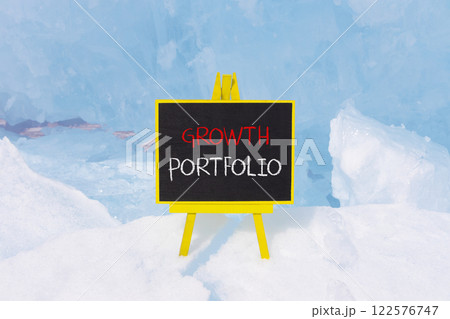 Growth portfolio symbol. Concept words Growth portfolio on beautiful yellow blackboard. Beautiful blue ice background. Business Growth portfolio concept. Copy space. 122576747