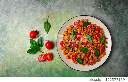 Tuscan pasta with smoked paprika and basil,parmesan cheese, Italian traditional cuisine, Tuscan pasta with smoked paprika and basil,parmesan cheese, Italian traditional cuisine, 122577139