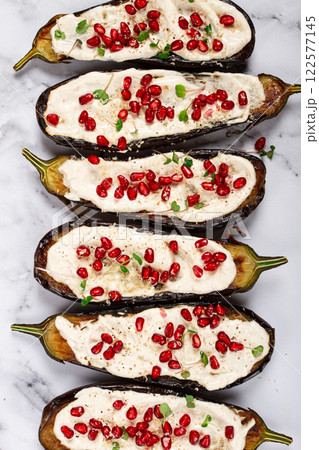 fried eggplant with sauce, decorated with microgreens and pomegranate seeds, eggplant appetizer, top view, homemade, no people, fried eggplant with sauce, decorated with microgreens and pomegranate seeds, eggplant appetizer, top view, homemade, no people, 122577145