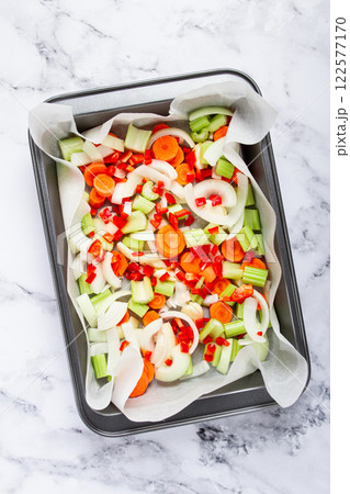 raw, chopped vegetables in a basket , ingredients for making ossobuco, top view, no people, raw, chopped vegetables in a basket , ingredients for making ossobuco, top view, no people, 122577170