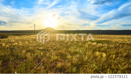 Aerial Sunset Over Gooseberry Mesa Utah with Rolling Hills and Utility Pole Aerial Sunset Over Gooseberry Mesa Utah with Rolling Hills and Utility Pole 122579121