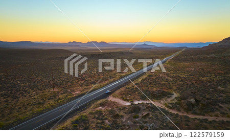 Aerial Fly Over Desert Road at Sunset in Utah 122579159
