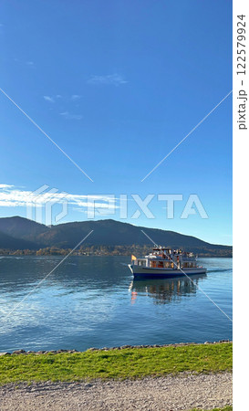 Scenic View of a Tourist Boat on Chiemsee Lake, Bavaria, Germany Scenic View of a Tourist Boat on Chiemsee Lake, Bavaria, Germany 122579924