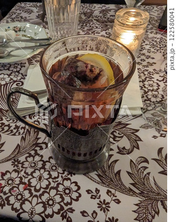 Traditional tea in a glass with a metal cup holder in a Russian restaurant in Portland, USA Traditional tea in a glass with a metal cup holder in a Russian restaurant in Portland, USA 122580041
