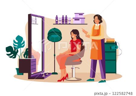 Hairstylist and Female Customer Talking in Hair Salon 122582748