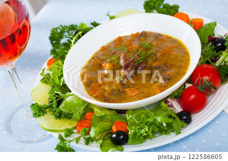 Delicious chicken hearts stew Delicious chicken hearts stew 122586605