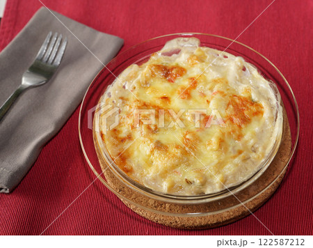 Macaroni Gratin dish on table. easy lunch Macaroni Gratin dish on table. easy lunch 122587212