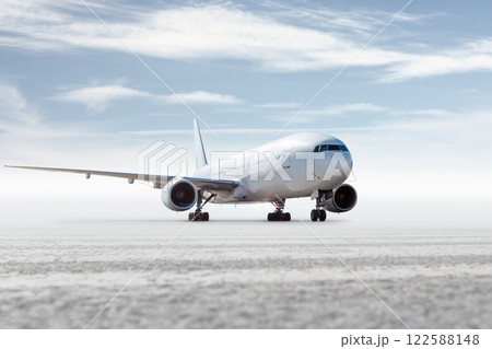 White wide body passenger airliner isolated on bright background with sky White wide body passenger airliner isolated on bright background with sky 122588148