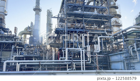 Oil refinery in Italy. Construction and structure in mountains. Minerals and energy. Oil refinery in Italy. Construction and structure in mountains. Minerals and energy. 122588579