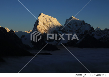 Cholatse and Taboche at sunset, view from Gokyo Ri, Nepal. 122588945