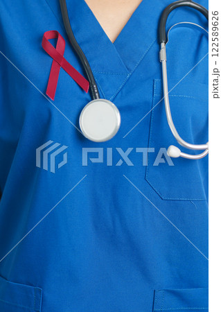 Doctor with Burgundy Red Ribbon for March multiple myeloma Cancer and December World Aids Day Awareness month. Healthcare and world cancer day concept Doctor with Burgundy Red Ribbon for March multiple myeloma Cancer and December World Aids Day Awareness month. Healthcare and world cancer day concept 122589626