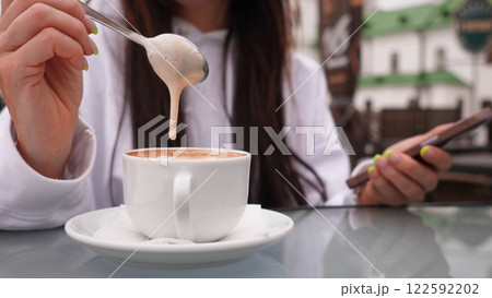 Indulging in a Delightful and Creamy Coffee Moment That Brings You Ultimate Joy and Comfort 122592202