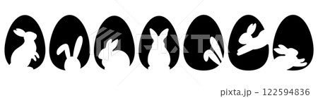 Set with black eggs and bunny silhouettes. Easter egg shape with bunny silhouette - traditional symbol of holiday. Easter rabbit inside egg. 122594836