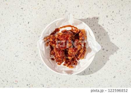 Crispy fried chicken thighs with red sauce Crispy fried chicken thighs with red sauce 122596852