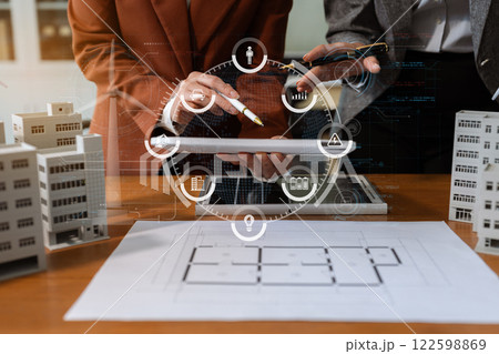 Asian business people using tablet for working technology and business, Renewable energy-based green businesses and global warming. Reduce CO2 emission. 122598869