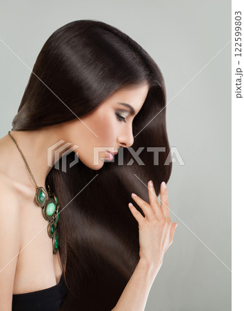 Gorgeous young adult woman with perfect hairstyle and make-up fashion beauty portrait 122599803