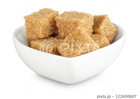 brown sugar in a ceramic bowl isolated on white background brown sugar in a ceramic bowl isolated on white background 122600607