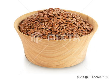 flaxseed in wooden bowl isolated on white background. Top view. Flat lay flaxseed in wooden bowl isolated on white background. Top view. Flat lay 122600680