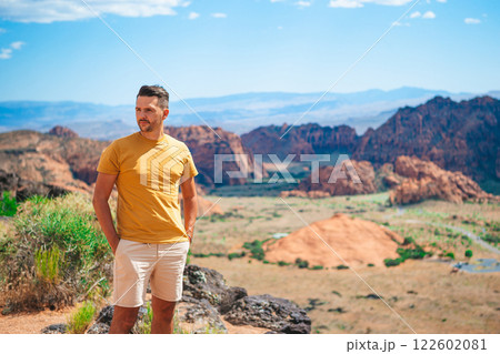 Young hiker man on his way in National Park in Utah. Man with in Zion national park Young hiker man on his way in National Park in Utah. Man with in Zion national park 122602081