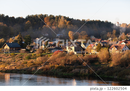 The city of Kraslava near Daugava in Latvia is surrounded by colorful autumn trees The city of Kraslava near Daugava in Latvia is surrounded by colorful autumn trees 122602504