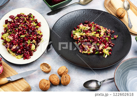 Healthy vegan beetroot salad with walnuts. Healthy vegan beetroot salad with walnuts. 122602618