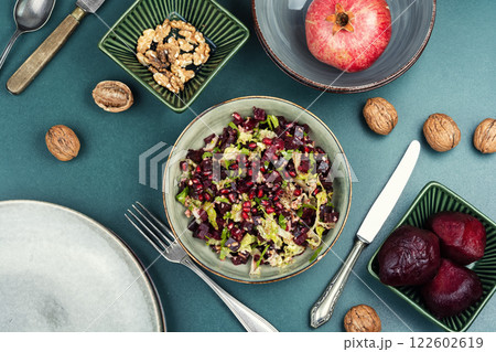 Beetroot pomegranate salad with nuts 122602619