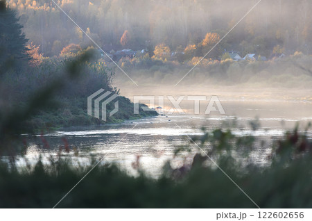 Golden sunset mist over Daugava river near Kraslava, Latvia 122602656