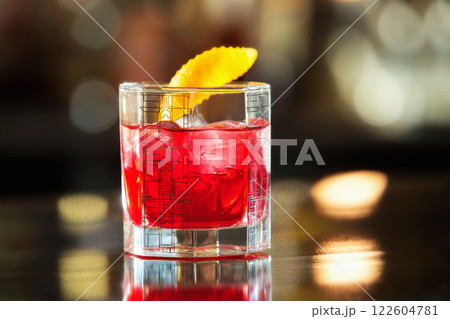 Closeup glass of red cherry juice at bar counter background. 122604781