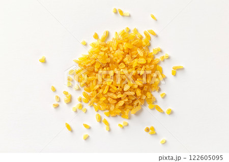 Pile of bulgur raw grain isolated at white background. Macro top view image. Pile of bulgur raw grain isolated at white background. Macro top view image. 122605095