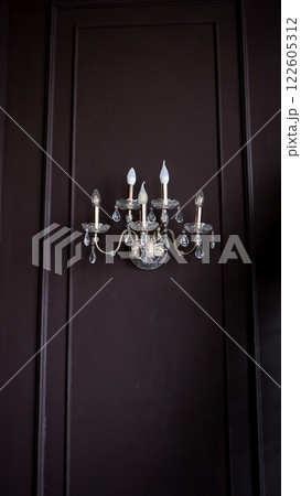 Luxury chandelier on wall 122605312