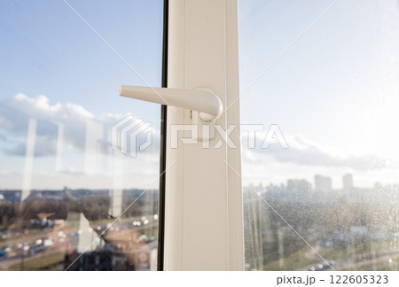 pvc windows on balcony 122605323