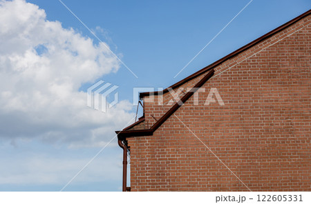building facade in red bricks. 122605331