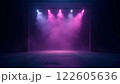 A dark, futuristic space illuminated by vibrant pink and purple lights with hazy fog 122605636