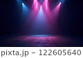 A dark, futuristic space illuminated by vibrant pink and purple lights with hazy fog 122605640