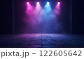 A dark, futuristic space illuminated by vibrant pink and purple lights with hazy fog 122605642