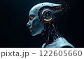 A highly detailed humanoid robot with glowing circuitry and a sleek design in a dark 122605660