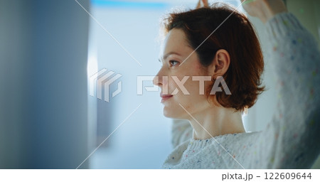 Airport Terminal: Close Up of Woman Passing Through X-ray Metal Detector Scanner Gates Airport Terminal: Close Up of Woman Passing Through X-ray Metal Detector Scanner Gates 122609644