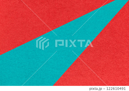 Texture old craft red and turquoise paper background, macro. Vintage abstract ruby cardboard with blue gradient Texture old craft red and turquoise paper background, macro. Vintage abstract ruby cardboard with blue gradient 122610491