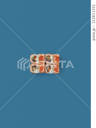 top shot on blue background lies a set of sushi with rice and seafood avocado sushi wrapped in salmon meat red caviar with seaweed professional Japanese cuisine kitchen sushi without shade top shot on blue background lies a set of sushi with rice and seafood avocado sushi wrapped in salmon meat red caviar with seaweed professional Japanese cuisine kitchen sushi without shade 122611352