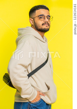 Happy lovely smiling young man looking at camera dreaming, resting, good news, feel satisfied 122614181